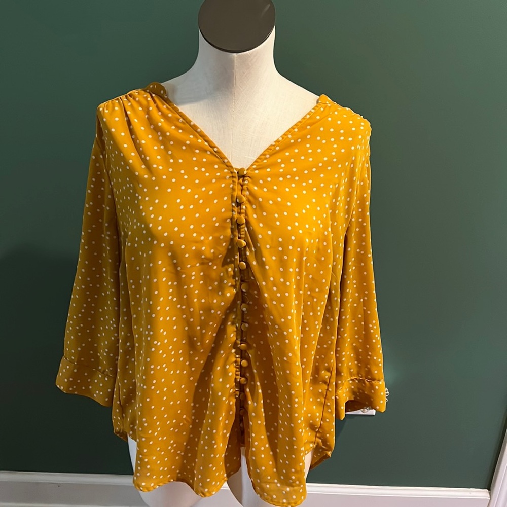 Torrid size 1 blouse. Yellow with white polka dots.